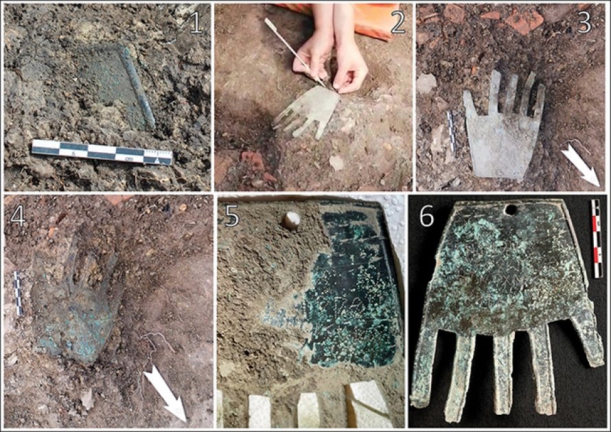 Bizarre 2,000-year-old bronze hand found covered in mysterious writing