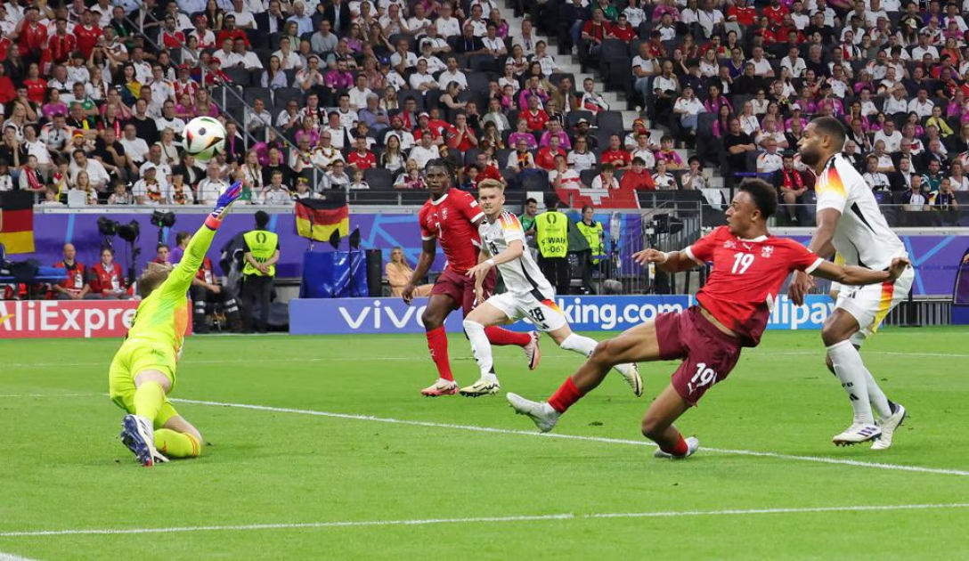 Switzerland make EURO 2024 last 16 despite draw with Germany
